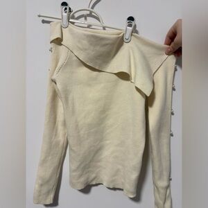 Off the shoulder sweater with sleeve pearl detail